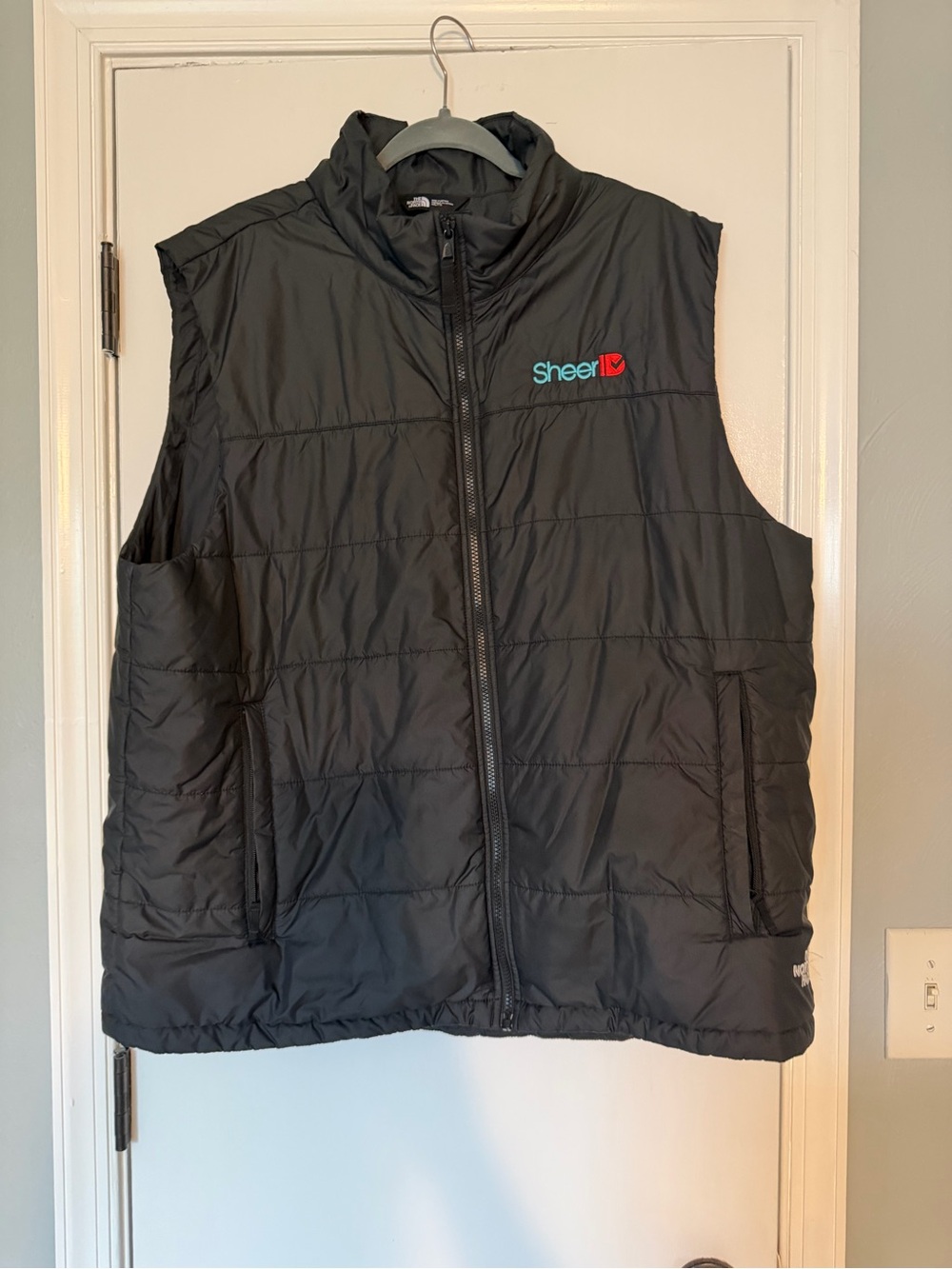 The North Face Black Quilted Sleeveless Vest with SheerID Logo